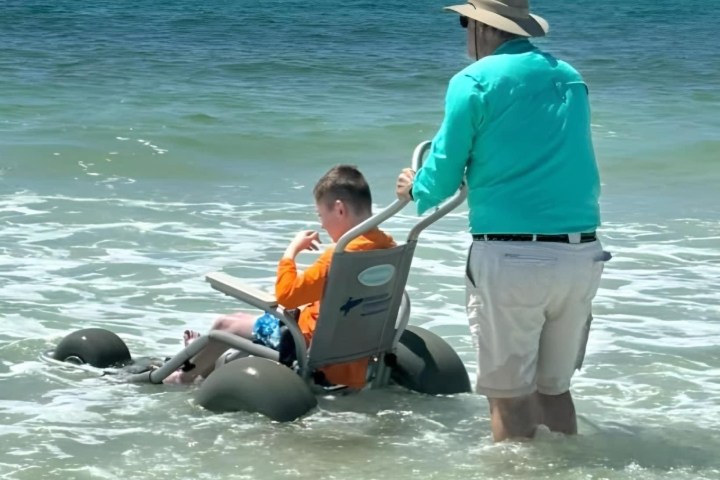a group of people in a body of water